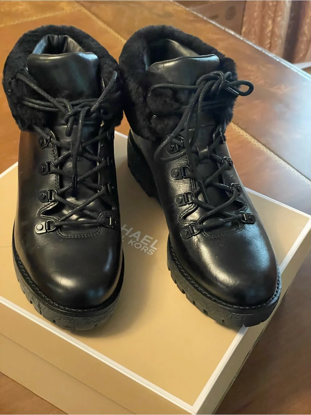 Michael Kors Black Leather Ankle boots with Fur Trim and Rubber Sole